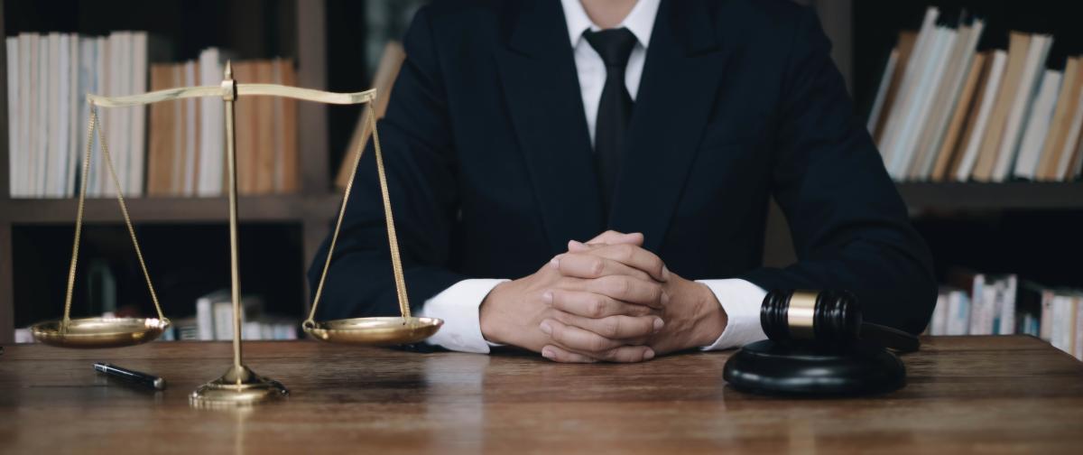 Personal Injury Lawyer at His Desk 